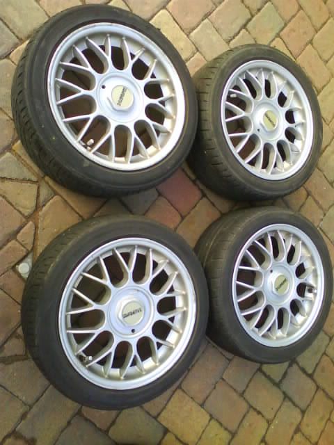 hi i am selling a set of very clean 4x100 compomotive alloys 16 70