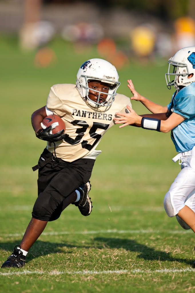 IMAGE: http://i239.photobucket.com/albums/ff66/mcgomez13/Panthers9_18-289.jpg